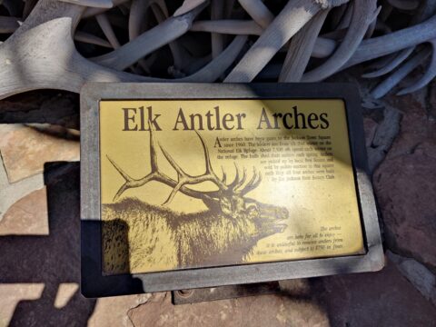Educational plaque about the antler arches in Jackson Hole's town square.