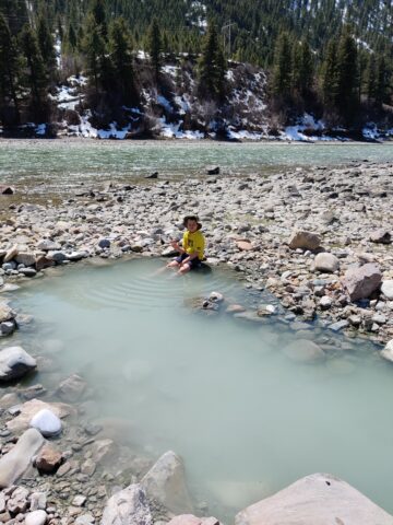 Soaking in the free Astoria Hot Springs.