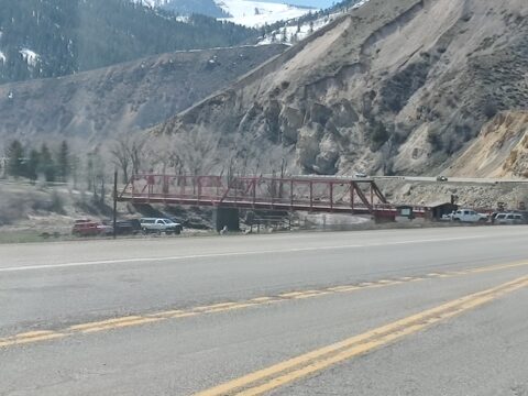 The red bridge near the free Astoria Hot Springs.